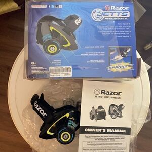Razor-Jetts/Heel Wheels. Real sparking action. Only worn as a try on in house.